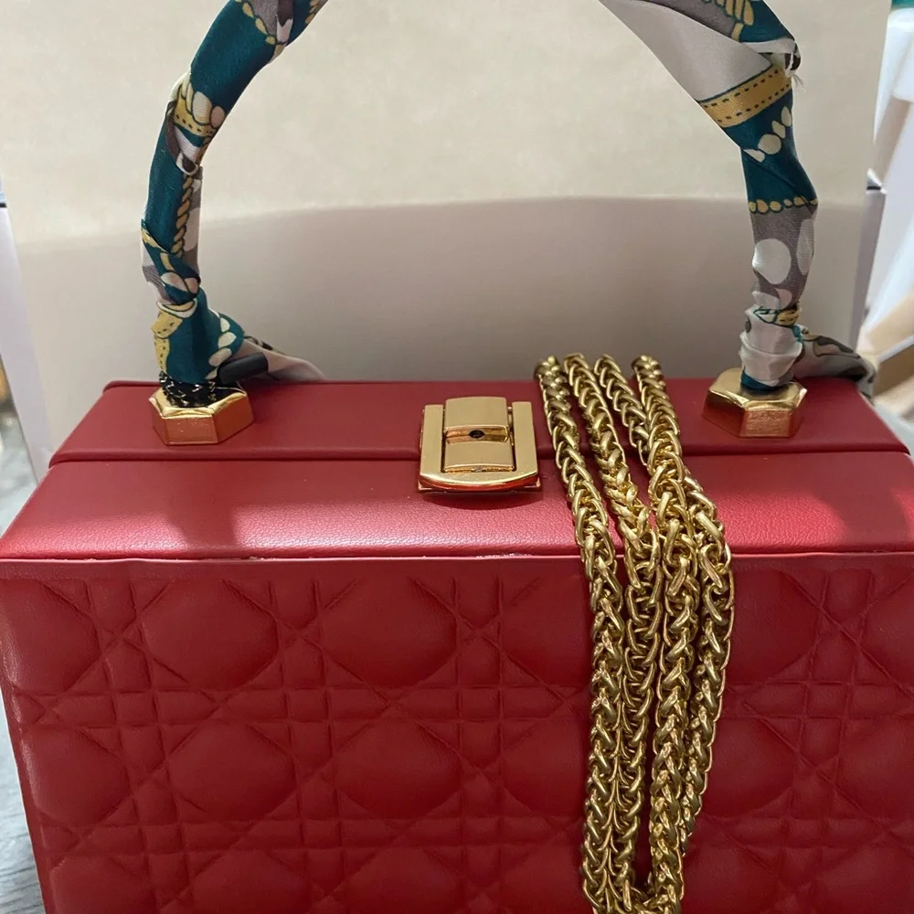 Elegant Red Quilted Handbag with Scarf Accent and Gold tone chain - Picture 4 of 5